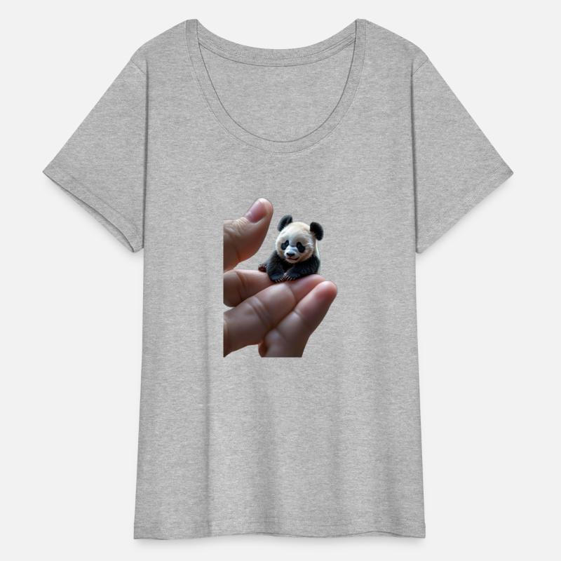 a tiny, finger-sized panda resting