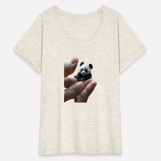 a tiny, finger-sized panda resting