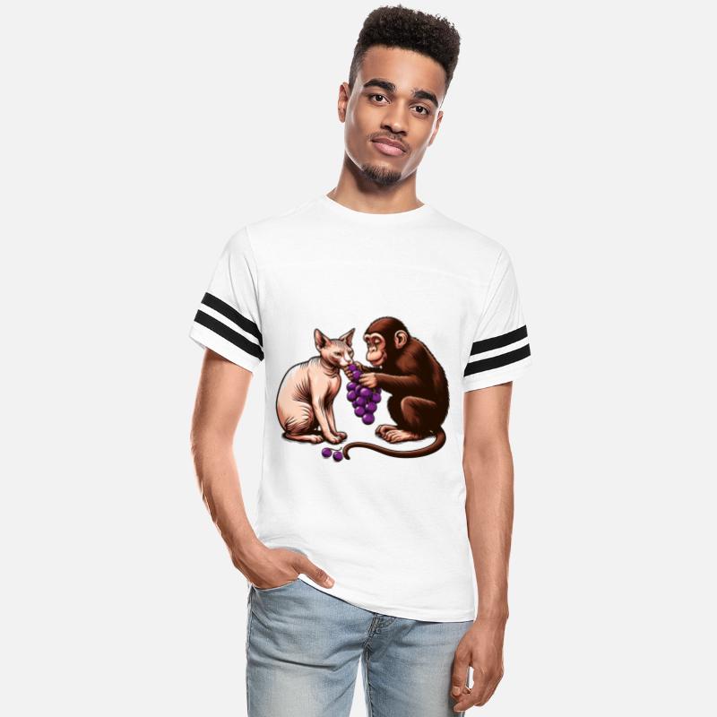 Monkey feeds sphinx cat with grapes